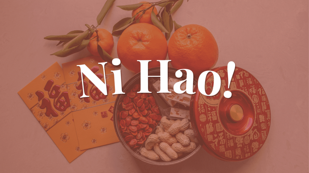 Chinese New Year celebration with oranges red envelopes and traditional snacks