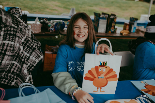 KVUE News interviews an Austin preschool child before the 2018 Turkey Trot