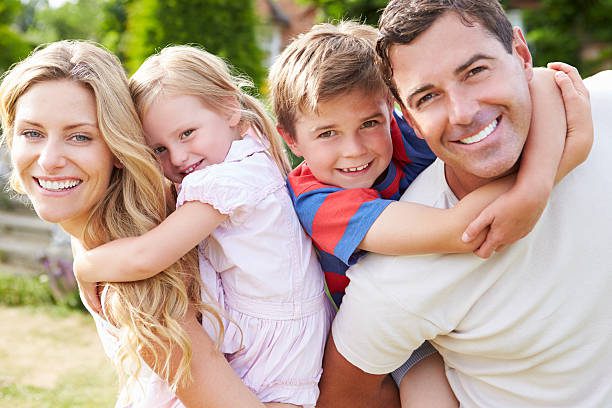 Happy family enjoying a sunny day outdoors