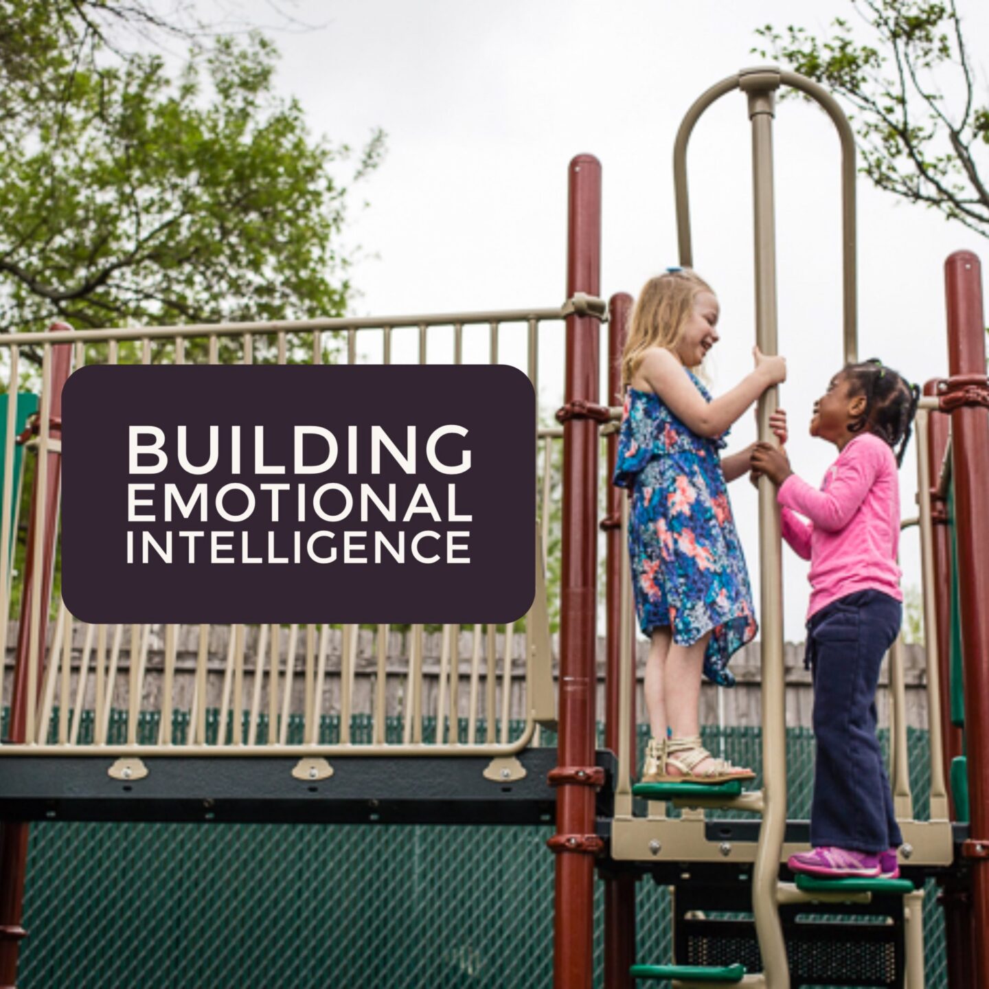 Children playing on a playground promoting emotional intelligence development