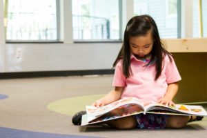 Austin Preschooler reading at Stepping Stone School Austin Preschooler reading at Stepping Stone School